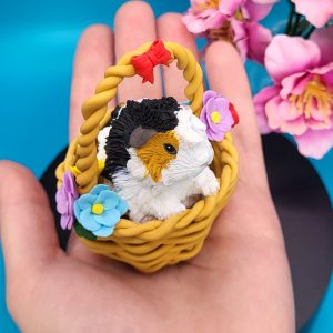 Summer Guinea Pig Sculpture in a Wicker Basket