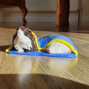 Guinea Pigs in blanket figurine