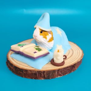 Bedtime Story Guinea Pig Sculpture