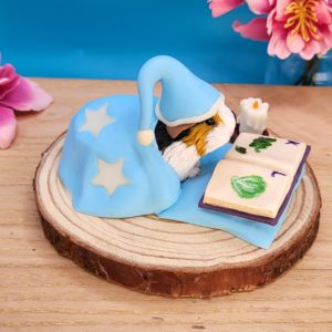 Reading guinea pig sculpture