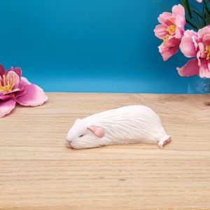 white guinea pig sculpture