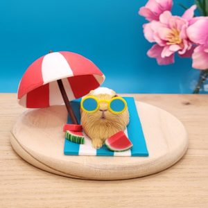 Beach ready Summer Guinea Pig Sculpture , made of polymer clay.